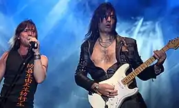 Rata Blanca's frontman Adrián Barilari and guitarist Walter Giardino in concert, 2008