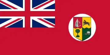 The design of the Red Ensign was modified slightly in 1912 when the shield was placed on a white disc so as to make it more distinguishable. The Red Ensign continued to be used as the flag of the South African merchant marine until 1951.