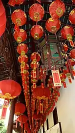 Red paper lanterns for sale in Shanghai. The color red symbolizes luck and is believed to ward away evil