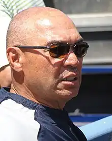 A side-view of Reggie Jackson wearing sunglasses.