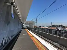 An elevated train station with its platform.