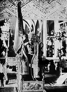 Reza Shah wearing the crown at his coronation.