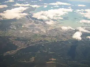 Stoke is slightly right of centre, lying between Richmond on the left and Tāhunanui under the coastal cloud on the right