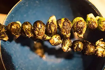 Brussels sprouts roasted over a fire