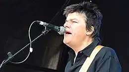 The lead singer appearing live in concert in 2014.