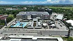 Aerial view of Pavia with Robinsons mall in the foreground