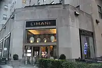 Storefront with a chamfered corner at 51st Street and Rockefeller Plaza