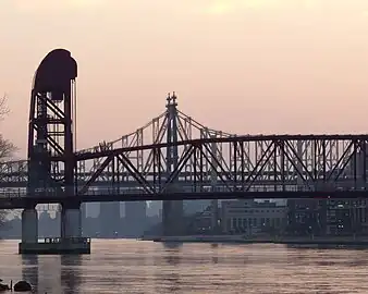 Queens side of Roosevelt Island Bridge, with the Queensboro Bridge in the background