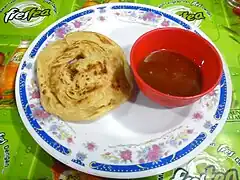 Roti canai, also known as roti parotta from Southeast Asia.