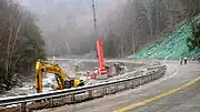 Repair of Route 2 after a 6-mile washout along the Cold River caused by Hurricane Irene.