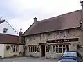 Stone building with sign saying The Royal Oak