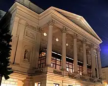 exterior shot of a classical facade of a large building