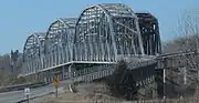 Steel bridge with three through truss spans