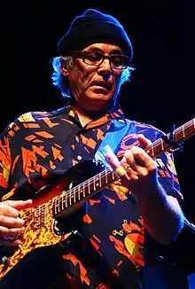 Ry Cooder plays slide guitar