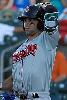 A baseball player in gray