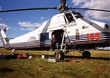 MNR contracts a variety of aircraft for fire fighting each year, such as this S-58T ready to deploy to a project fire, Dryden, Ontario, 1995