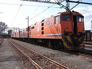 No. E1089 in Spoornet lined orange livery at Ladysmith, 5 August 2007