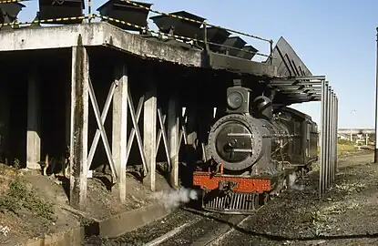 Class 7BS no. 1056 being coaled from cocopans at George, 16 July 1999