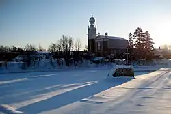 Church and river in Sainte-Catherine-de-la-Jacques-Cartier