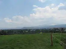 Looking southeast from the top of the main pyramid of Cuicuilco toward the boroughs of Tlalpan and Xochimilco