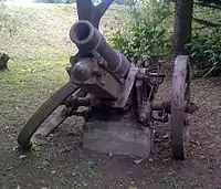 The remains of a German sFH 02 howitzer located in Kei Mouth, South Africa. It was captured from German forces in South West Africa during World War I. Like other such German weapons of the time, it was cast with the markings R II Ultima Ratio Regum ("last argument of kings").