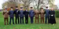 Old Suttonians, including serving officers and Jack Noble, at the World War II memorial dedication