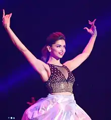 A shot of Deepika Padukone dancing on stage