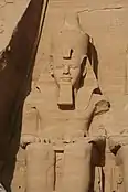 Statue at Abu Simbel of Ramesses II wearing the pschent atop a nemes