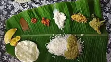 Sadya, a traditional platter originated from the Indian state of Kerala, served on Banana leaf