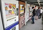 A line of vintage vending machines at the Sagamihara Vending Machine Park, Kanagawa, Japan