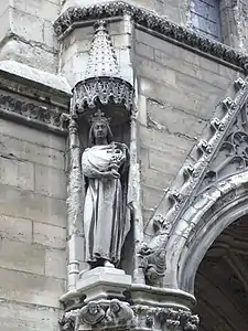 Louis IX holding a fragment of the true cross