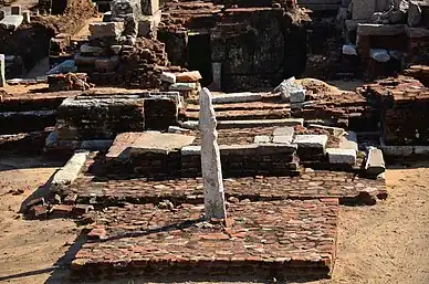 Stone vel on a brick platform at the entrance to the Murugan Temple, Saluvankuppam, unknown architect, 300 BC