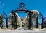 Salve Regina University's gates frame the building's driveway