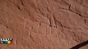 Side-by-side rock carvings