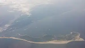 Sandy Hook seen from an airplane (looking west) on its approach to JFK International Airport in New York City