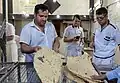 The baker is delivering the bread.