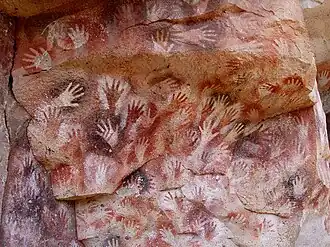 Cueva de las Manos located in Argentina. The art in the cave dates between 13,000–9,000 BP.