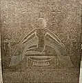 Relief of a woman kneeling on a stool and spreading her arms, to which wings are attached