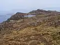 A view northwards along the summit ridge from a short distance north of the highest point