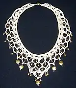 Necklace made from crochet lace, pearls, and sterling silver.