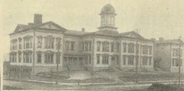 The 1884 Denny School (depicted here in 1900) on Battery Street between Fifth & Sixth Avenues was demolished in 1928, one of many major buildings demolished as part of Denny Regrade No. 2.