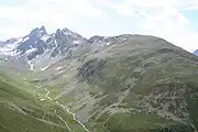 Segantinihütte [de] (Death place of Giovanni Segantini) on top of the grassy summit