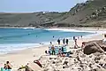 People enjoying at Sennen Cove Beach