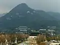 View over the Gyeongbokgung and the Blue House at the foot of Bugaksan