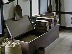 Shaker seeds in a big chest being prepared for placing into envelope "papers" of seed packets