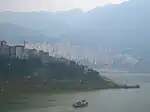 The fall of the Shennong Stream (in front) into the Yangtze