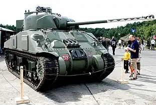 A Firefly VC in Ursel Air Base, Belgium; gun barrel is painted with countershading pattern used to disguise length