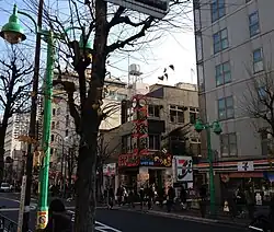 Businesses in Ōkubo. The orange sign in the center is named for Namdaemun, a famous landmark in Seoul (2012)