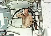 Jack Lousma takes a shower in the station's living quarters.