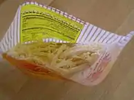 Commercially prepared dried shredded squid